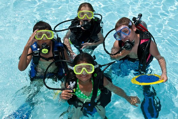 scuba diving training in pool for kids